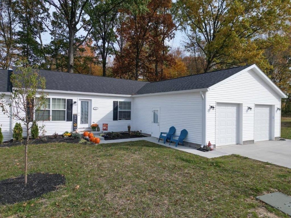 Exterior of a Hangar Flats home with attached garage