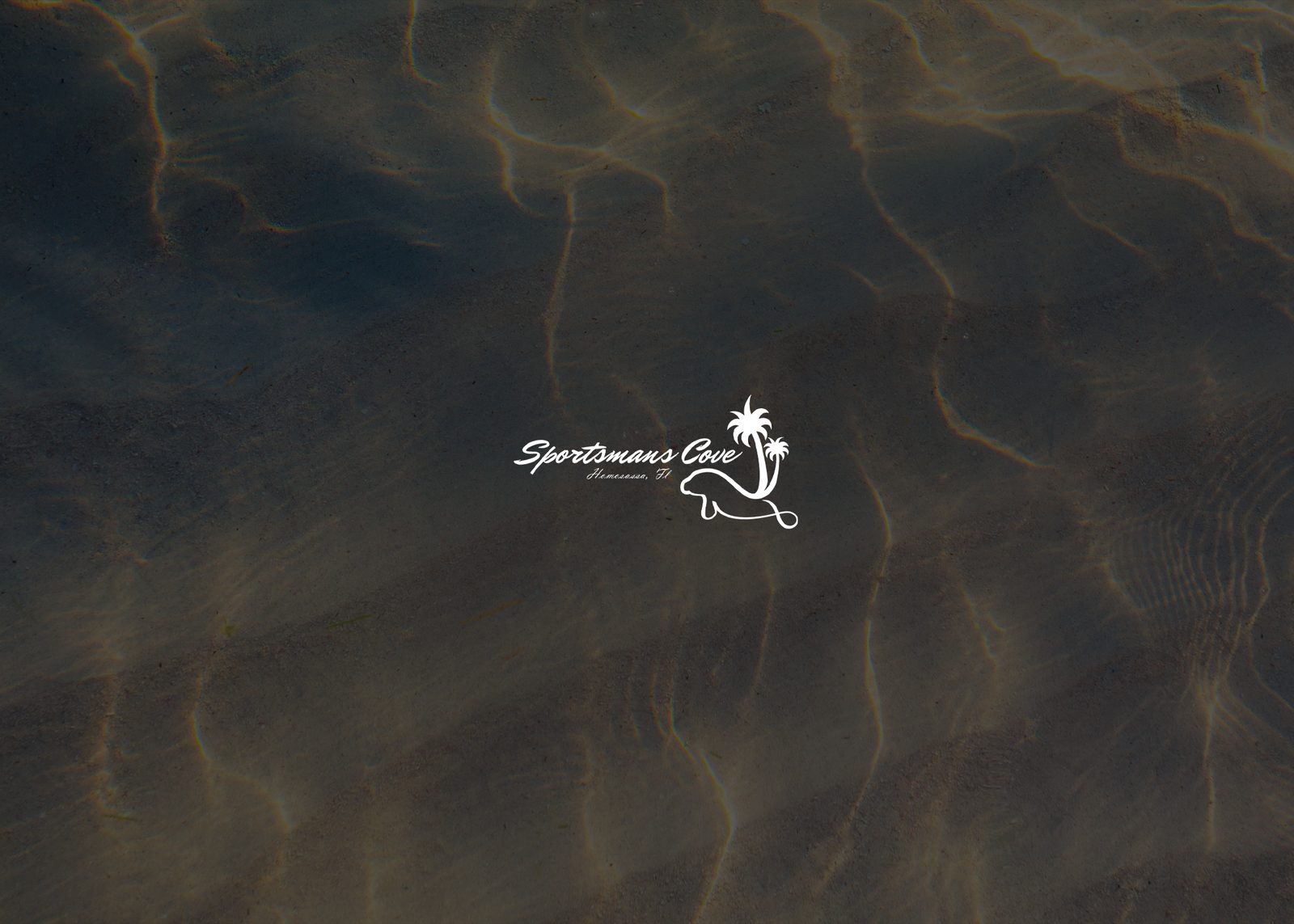 Sportsmans Cove logo over clear water