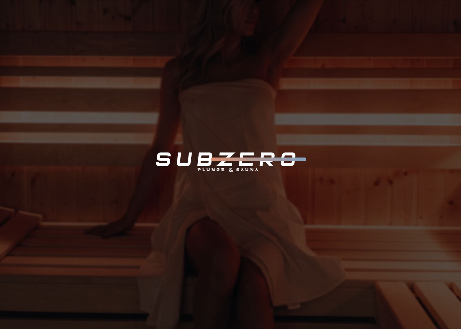 SubZero logo over warm sauna photography